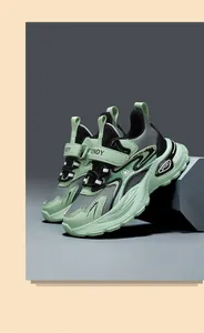 Side view detail of mint green children's athletic sneakers with chunky sole