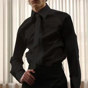 Close-up of the elegant mesh sleeve texture on a black long-sleeve formal men's shirt