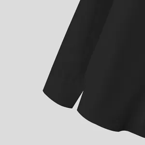 Detail view of the black men's French banquet shirt showing sleeve cuff and hem.