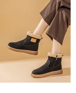 Women's warm black snow boots with plush lamb wool lining and soft flat soles