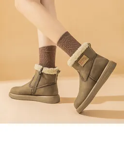 Detail view of women's vintage snow boots with plush lamb wool lining and zipper