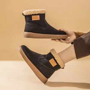 Warm winter snow boots for women with cozy lamb wool lining and vintage flat soles.