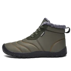 Detailed side view of a green waterproof outdoor winter boot with thick gray fur lining