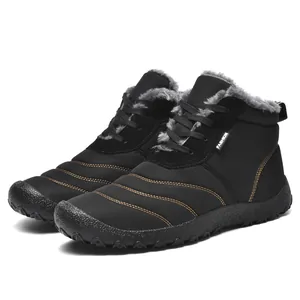 Detailed side view of black outdoor winter boots with warm fur lining and non-slip sole