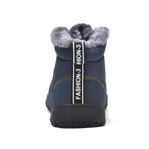 Back view detail of warm outdoor snow boots with grey faux fur lining and heel strap.