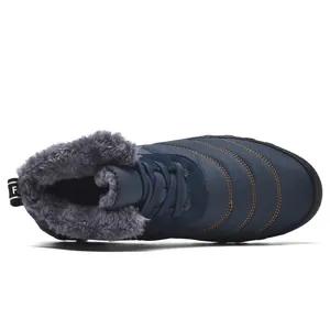 Top view detail of navy blue winter outdoor boot featuring thick grey faux fur lining