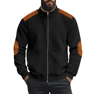 Close-up detail of a men's black ribbed zip-up jacket with brown shoulder and elbow patches