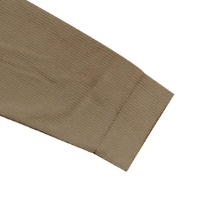 Detailed close-up showing the ribbed knit texture and cuff of a heavy khaki winter zip-up jacket