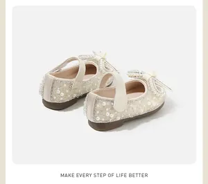 Elegant pearl and rhinestone embellished baby girl Mary Jane princess shoes with bow detail