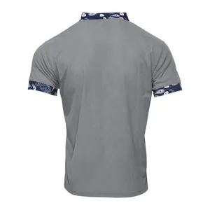 Back view of men's grey corduroy short-sleeve shirt with paisley collar and cuff details.