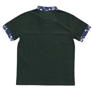 Back view detail of dark green corduroy henley shirt featuring paisley pattern trim.