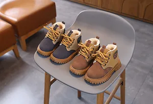 Detailed view of children's fleece-lined Martin boots with non-slip soles for winter