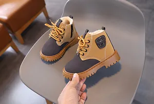 Detail view of warm children's Martin boots with soft fleece lining and non-slip sole