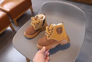 Detailed view of kids' winter Martin boots with warm fleece lining and non-slip sole