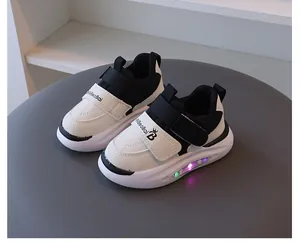 Baskets LED lumineuses pour enfants noir et blanc avec velcro et semelle antidérapante