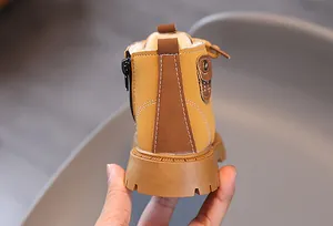 Close-up of children's warm Martin boot showing heel stitching and side zipper detail