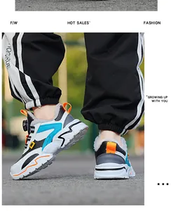 Outdoor detail view of boys' winter fleece-lined warm sports shoes with thick soles