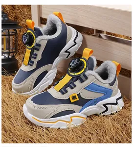 Side view of boys winter sneakers with thick fleece lining and rotary buckle