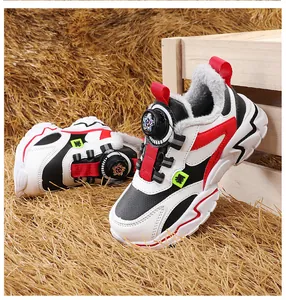Close-up of boys thick-soled winter sneakers featuring warm fleece lining and rotary dial