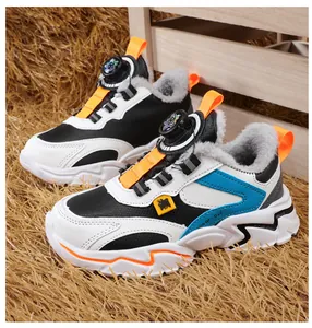 Detailed macro shot of kids' winter sneakers with warm fleece lining and rotating dial lace