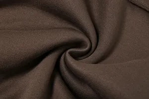 Détail macro de la texture du tissu marron doux en mélange de coton