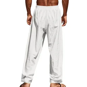 Detailed back view of men's loose white linen straight-leg pants with elastic waist