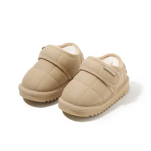 Warm beige toddler snow boots featuring cozy fleece lining and adjustable Velcro straps