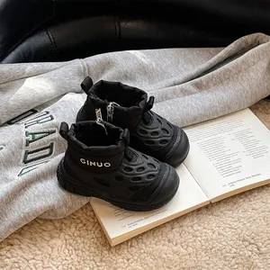 Detail view of black waterproof children's snow boots with cozy fleece lining