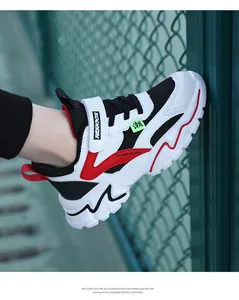 Detailed close-up of breathable children's mesh sneaker with wavy EVA foam sole.