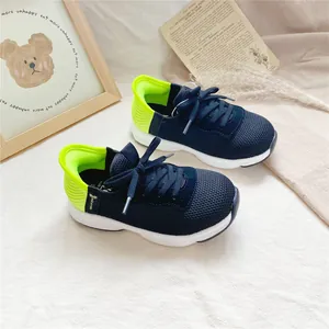 Detailed view of WOW breathable navy and neon green slip-on sports shoes for kids