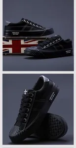 Black canvas men's casual sneakers featuring white stitching and a shell toe detail