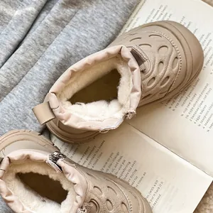 Beige children's waterproof snow boots with warm faux fur lining and side zipper