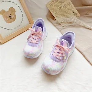 Close-up of children's purple tie-dye breathable mesh sneakers with pink laces