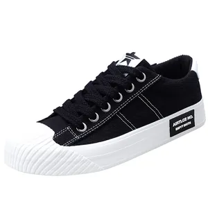 Fashionable black men's casual canvas sneakers with white shell toe and flat sole design