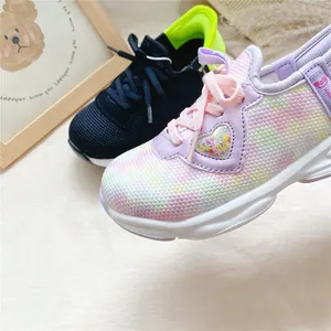 Detail of kids breathable mesh slip-on sneakers featuring a cute heart star pattern.