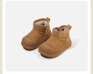 Close-up of brown toddler snow boots with warm fleece lining and side zipper detail.
