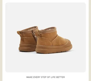 Detailed view of brown toddler snow boots with warm plush lining and side zipper.