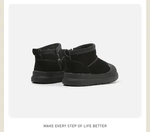 Rear view of black children's warm fleece-lined snow boots featuring side zipper detail