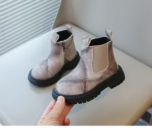 Detailed side view of girls' vintage denim print ankle boots with side zipper