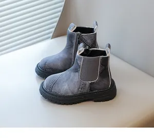 Grey denim-textured children's Chelsea boots with side zipper and elastic panel.