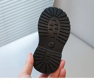 Detailed view of the non-slip rubber sole for children's British style Martin boots