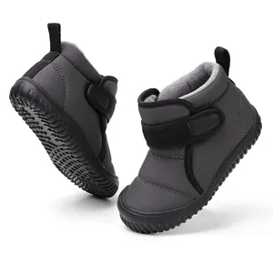 Detailed side and sole view of grey plush-lined children's warm winter snow boots.