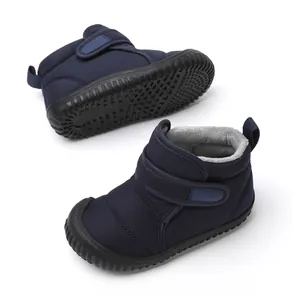 Navy blue children's fleece-lined snow boots with non-slip rubber soles and velcro.