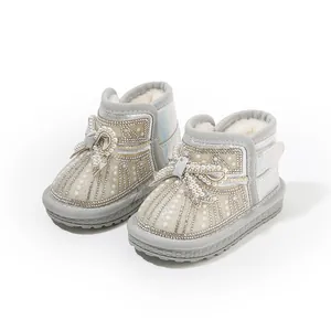 Girl's iridescent snow boots with pearls, rhinestones, and warm faux fur lining