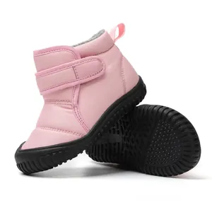 Pink children's winter snow boots with warm fleece lining and non-slip rubber soles