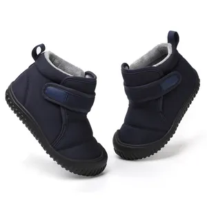 Cozy dark blue children's winter snow boots with warm fleece lining and Velcro strap