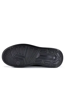 Detailed view of black anti-slip rubber outsole for men's casual leather shoes