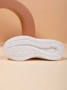 Detailed view showing the textured white anti-slip outsole of breathable kids sports shoes