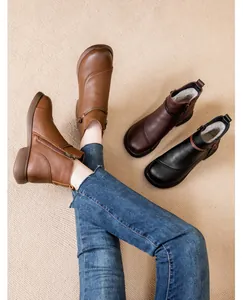 Winter ankle boots for women featuring warm plush lining and a convenient side zipper