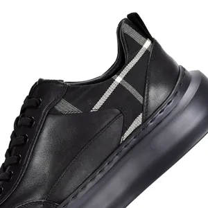 Black leather men's sneakers with thick sole and classic plaid pattern detail
